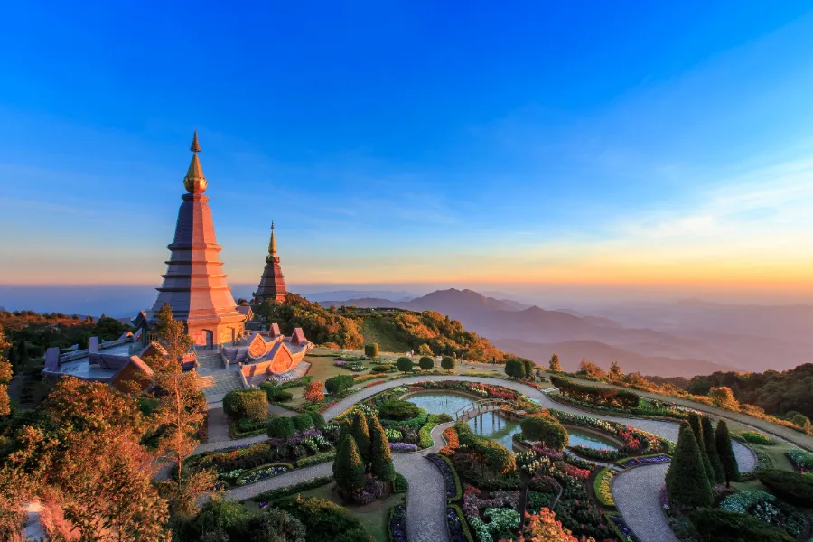 Mountain-top pagodas above Chiang Mai at sunset